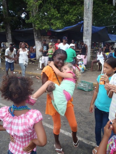 Hanalei and local kids in the street at Bocas Del Toro Carnival 2011