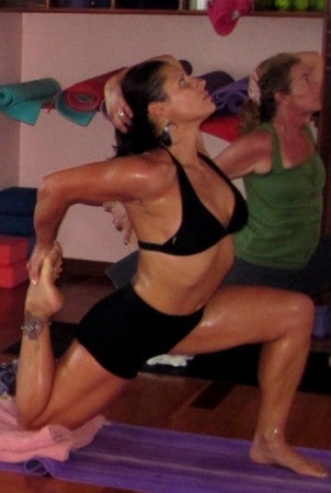 Rhonda Swan strikes a yoga pose in Bocas del Toro, Panama